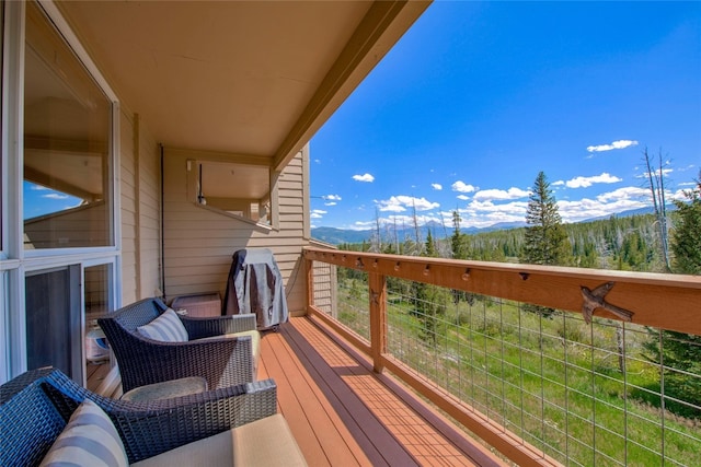 balcony featuring a mountain view