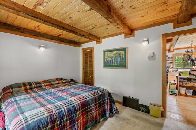389 Routt Forest Loop, Craig, CO 81625 - bedroom with a wooden ceiling with exposed beams