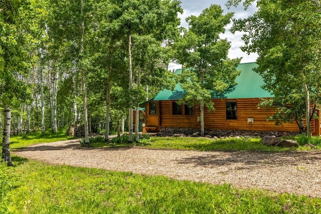389 Routt Forest Loop, Craig, CO 81625 - rear view of property featuring a metal roof
