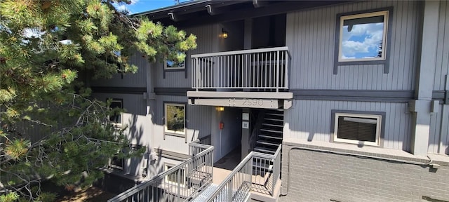2590 Longthong Rd Unit 211, Steamboat Springs, CO 80487 - view of building exterior featuring stairs