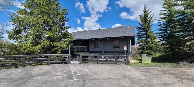 2590 Longthong Rd Unit 211, Steamboat Springs, CO 80487 - view of front facade featuring roof with shingles