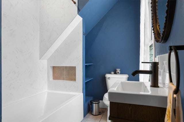 225 N Poplar St, Hayden, CO 81639 - full bath with toilet, tile patterned flooring, vanity, and bathing tub / shower combination