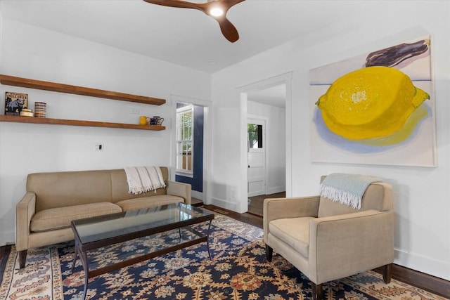 225 N Poplar St, Hayden, CO 81639 - living room featuring baseboards, a ceiling fan, and wood finished floors