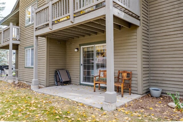 exterior space featuring a patio area and a balcony