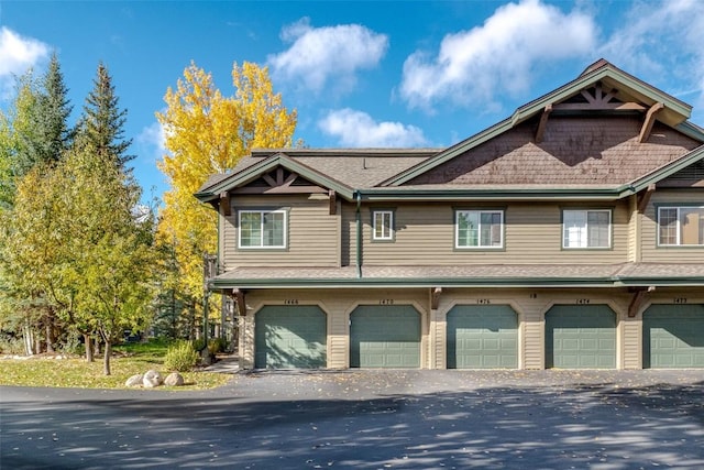 view of front of house with a shingled roof