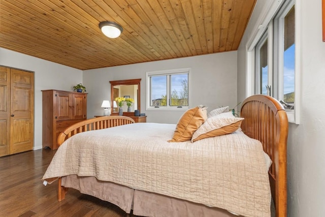 1763 Brome Dr, Steamboat Springs, CO 80487 - bedroom with dark wood-style flooring and wood ceiling