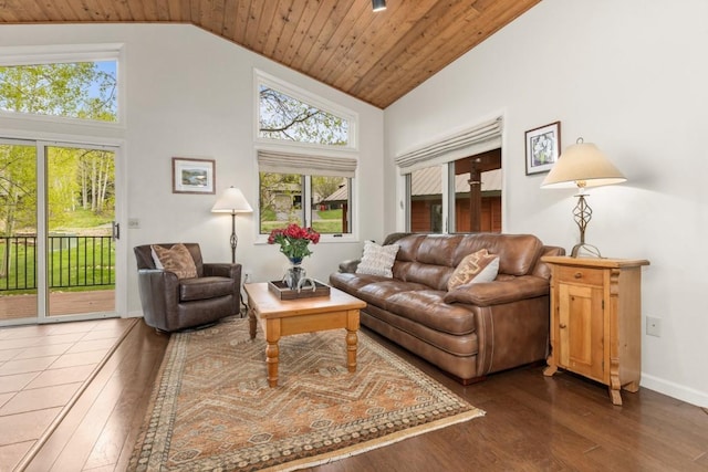 1763 Brome Dr, Steamboat Springs, CO 80487 - living area with hardwood / wood-style flooring, wood ceiling, high vaulted ceiling, and baseboards
