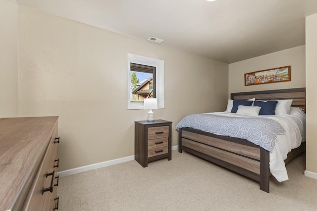 1763 Brome Dr, Steamboat Springs, CO 80487 - bedroom featuring baseboards and light carpet