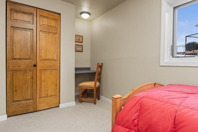 1763 Brome Dr, Steamboat Springs, CO 80487 - bedroom featuring light colored carpet and baseboards
