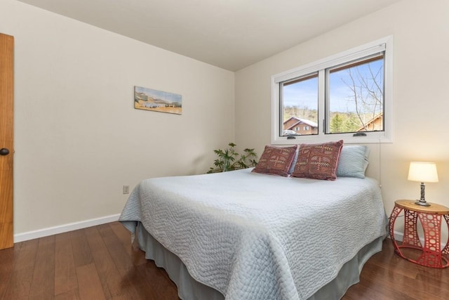 1763 Brome Dr, Steamboat Springs, CO 80487 - bedroom with hardwood / wood-style flooring and baseboards