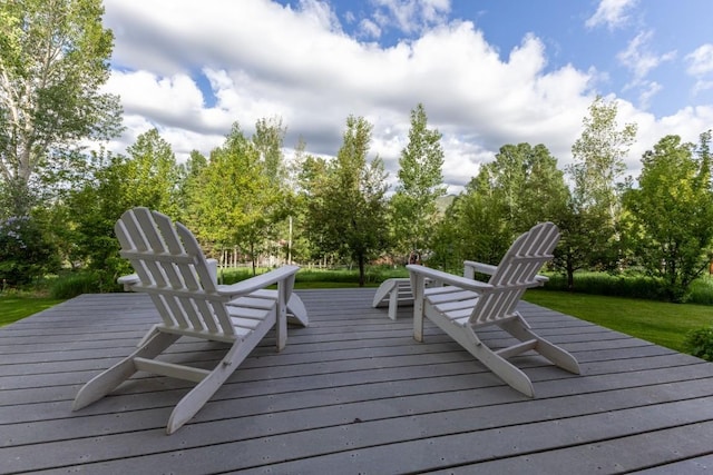 1763 Brome Dr, Steamboat Springs, CO 80487 - wooden terrace with view of wooded area