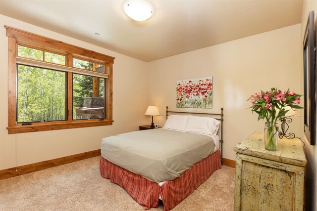 460 Two Cabins Dr, Silverthorne, CO 80498 - bedroom featuring light colored carpet and baseboards