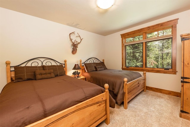 460 Two Cabins Dr, Silverthorne, CO 80498 - bedroom featuring baseboards and light colored carpet