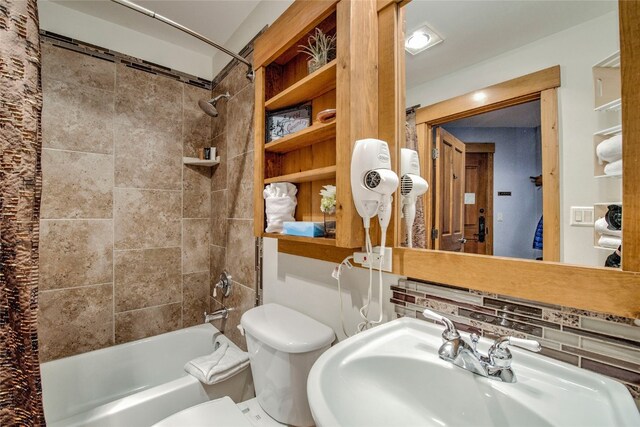 53 Hunki Dori Ct Unit 8863, Keystone, CO 80435 - bathroom featuring a sink, shower / bath combination with curtain, and toilet