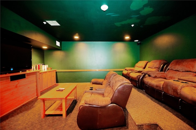 carpeted home theater room with recessed lighting