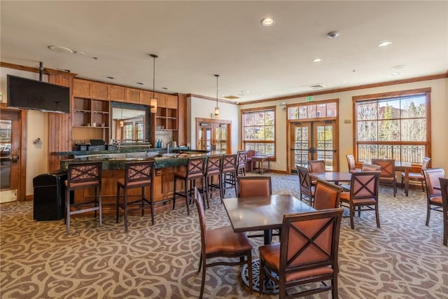 505 S Main St Unit 2207, Breckenridge, CO 80424 - dining space featuring light colored carpet, french doors, recessed lighting, healthy amount of natural light, and crown molding