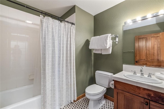 505 S Main St Unit 2207, Breckenridge, CO 80424 - full bathroom with vanity, shower / tub combo with curtain, toilet, a textured wall, and baseboards