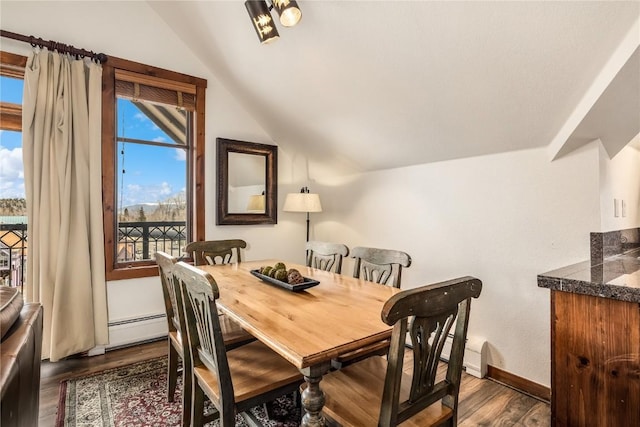 505 S Main St Unit 2207, Breckenridge, CO 80424 - dining room featuring lofted ceiling, dark wood-style flooring, a baseboard radiator, and baseboards