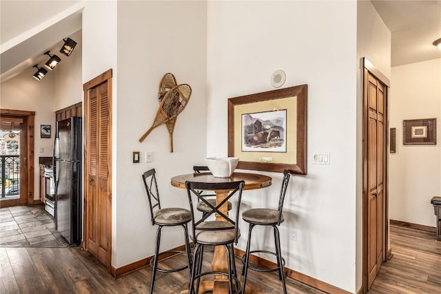 505 S Main St Unit 2207, Breckenridge, CO 80424 - dining area with dark wood-style floors and baseboards
