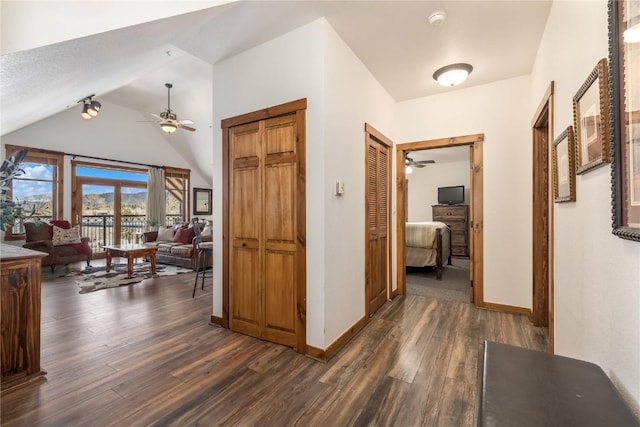 505 S Main St Unit 2207, Breckenridge, CO 80424 - hallway with dark wood-type flooring, vaulted ceiling, and baseboards