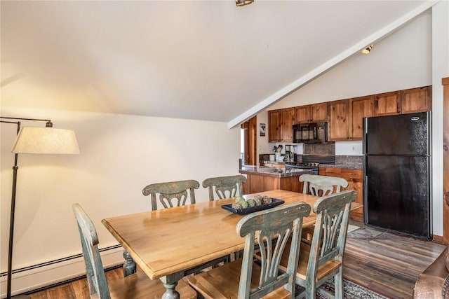 505 S Main St Unit 2207, Breckenridge, CO 80424 - dining area with vaulted ceiling, dark wood-style flooring, and baseboard heating