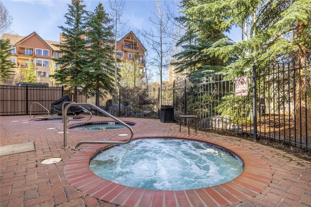505 S Main St Unit 2207, Breckenridge, CO 80424 - view of swimming pool featuring a community hot tub and a patio area
