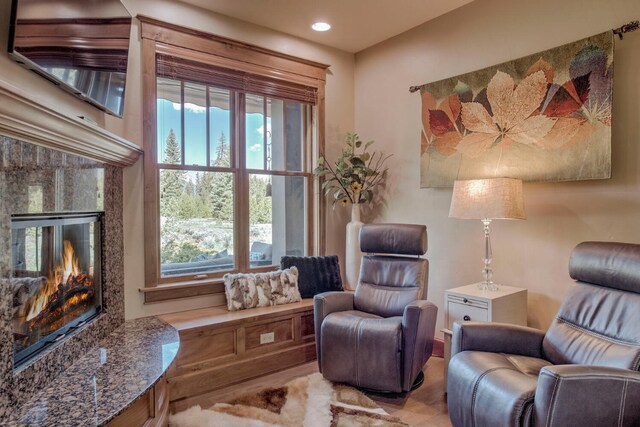 862 Penstemon Rd, Keystone, CO 80435 - living area with recessed lighting, a high end fireplace, and plenty of natural light
