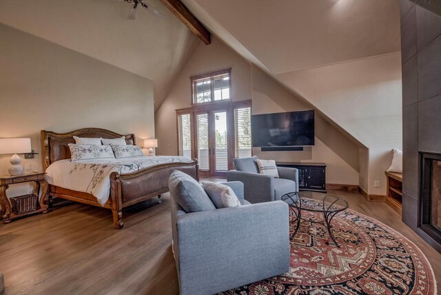 862 Penstemon Rd, Keystone, CO 80435 - bedroom featuring beamed ceiling, wood finished floors, and high vaulted ceiling