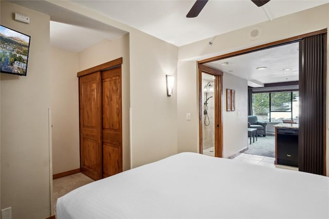640 Village Rd Unit 4326, Breckenridge, CO 80424 - bedroom with baseboards, a ceiling fan, and light tile patterned flooring