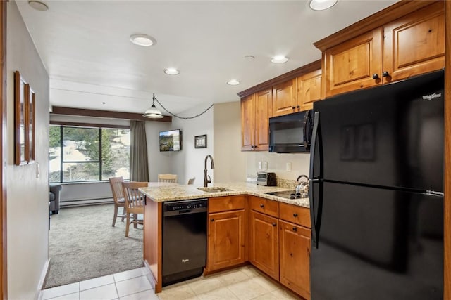 640 Village Rd Unit 4326, Breckenridge, CO 80424 - kitchen featuring a peninsula, light stone countertops, a baseboard heating unit, brown cabinets, and black appliances