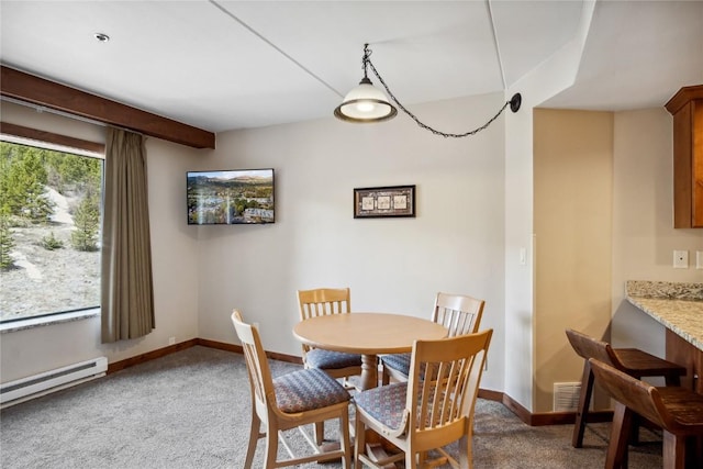 640 Village Rd Unit 4326, Breckenridge, CO 80424 - dining space featuring baseboards, a baseboard radiator, and carpet