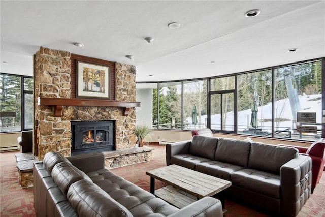 640 Village Rd Unit 4326, Breckenridge, CO 80424 - carpeted living room with a baseboard radiator, a baseboard heating unit, and a fireplace