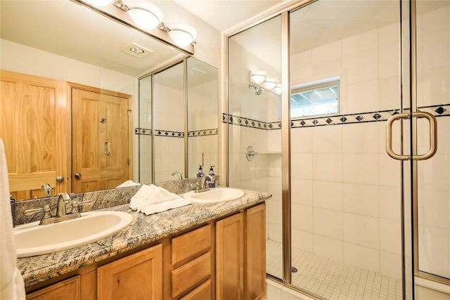 233 Creekside Dr Unit 104, Frisco, CO 80443 - bathroom featuring a stall shower and double vanity