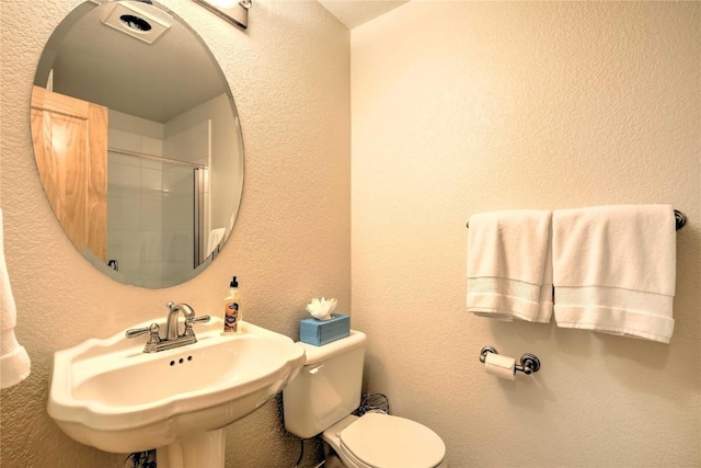 233 Creekside Dr Unit 104, Frisco, CO 80443 - bathroom with a sink, toilet, and walk in shower