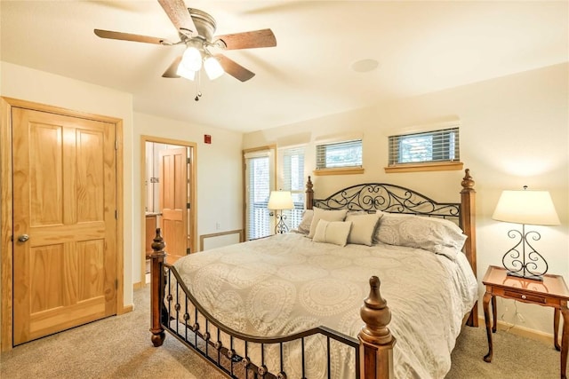 233 Creekside Dr Unit 104, Frisco, CO 80443 - bedroom with light colored carpet, baseboards, and a ceiling fan
