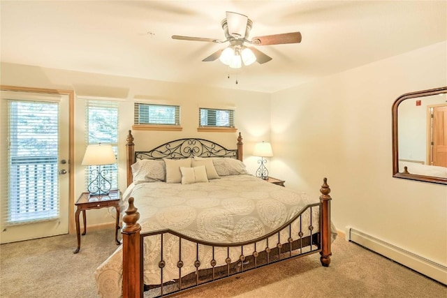 233 Creekside Dr Unit 104, Frisco, CO 80443 - bedroom featuring baseboard heating, carpet, and a ceiling fan