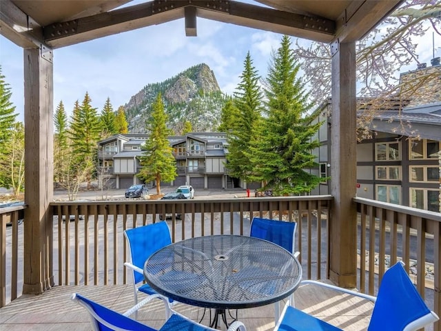 233 Creekside Dr Unit 104, Frisco, CO 80443 - deck featuring outdoor dining space and a mountain view