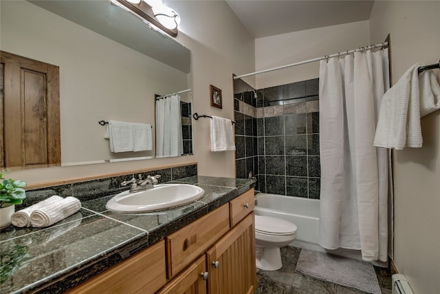 74 Stag Trl Unit 74, Dillon, CO 80435 - bathroom featuring a baseboard radiator, vanity, and shower / bath combo with shower curtain