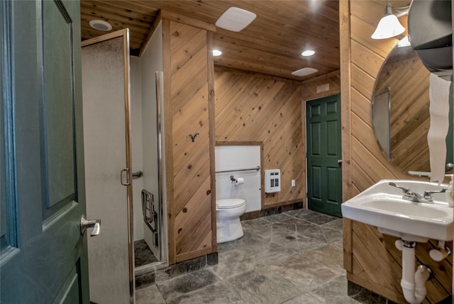74 Stag Trl Unit 74, Dillon, CO 80435 - full bathroom with wood ceiling, heating unit, a shower stall, wooden walls, and recessed lighting