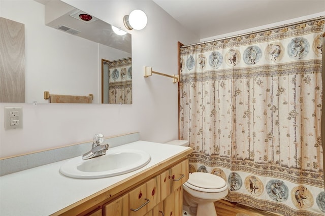 103 Foxtail Ct, Fairplay, CO 80440 - full bath featuring vanity, wood finished floors, and curtained shower