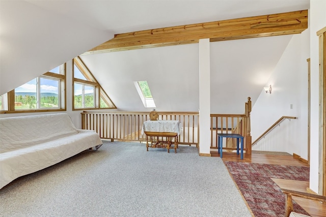 103 Foxtail Ct, Fairplay, CO 80440 - sitting room with a skylight, an upstairs landing, lofted ceiling, and carpet