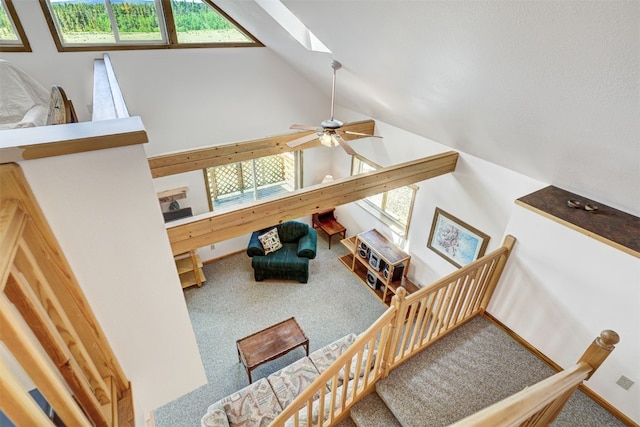 103 Foxtail Ct, Fairplay, CO 80440 - stairs featuring carpet floors, a skylight, lofted ceiling, and ceiling fan