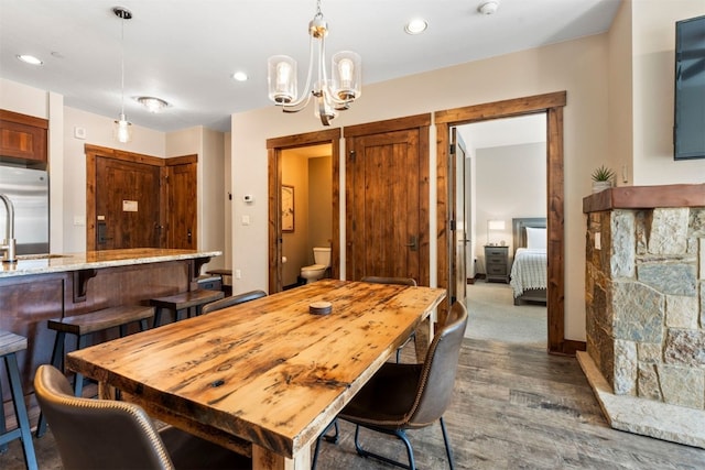 600 Columbine Rd Unit 5306, Breckenridge, CO 80424 - dining room featuring dark wood-style floors, a chandelier, recessed lighting, and baseboards