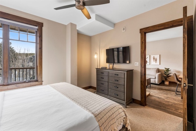 600 Columbine Rd Unit 5306, Breckenridge, CO 80424 - bedroom with baseboards, ceiling fan, and wood finished floors