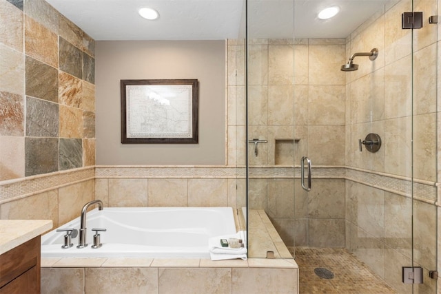 600 Columbine Rd Unit 5306, Breckenridge, CO 80424 - full bath featuring a bath, a stall shower, vanity, and recessed lighting