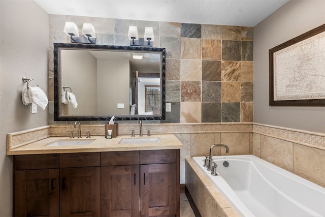600 Columbine Rd Unit 5306, Breckenridge, CO 80424 - bathroom with tile walls, a garden tub, and double vanity