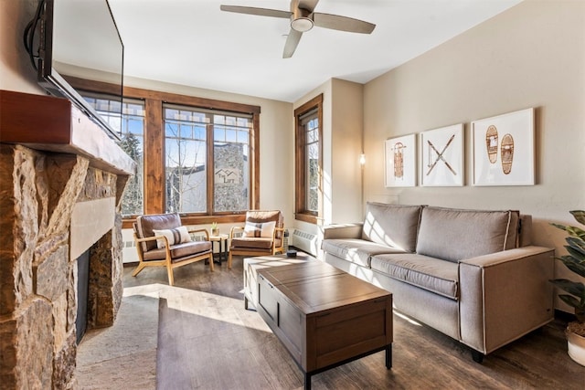 600 Columbine Rd Unit 5306, Breckenridge, CO 80424 - living room with wood finished floors, a ceiling fan, and a fireplace