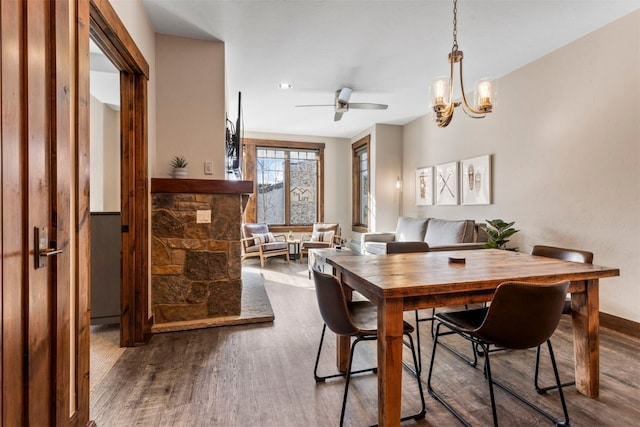 600 Columbine Rd Unit 5306, Breckenridge, CO 80424 - dining room with wood finished floors, a ceiling fan, and a chandelier