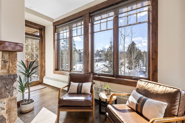 600 Columbine Rd Unit 5306, Breckenridge, CO 80424 - sunroom with radiator and wood finished floors