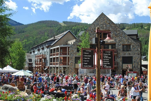 129 River Run Rd Unit 8040, Keystone, CO 80435 - view of building exterior with a view of trees and a mountain view